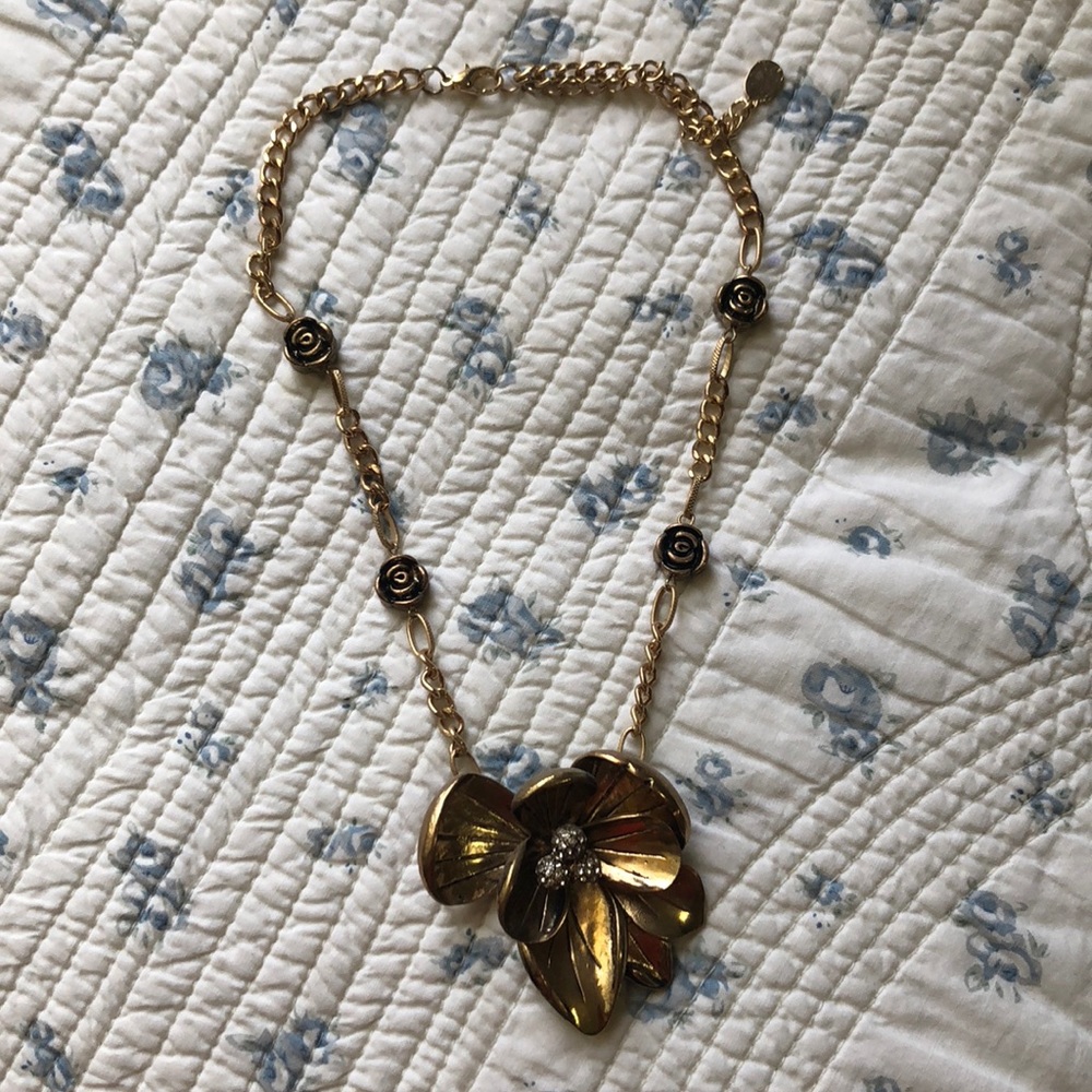 Gold colored necklace